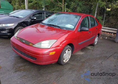 2004 Ford Focus Lx z USA, uszkodzony, nr VIN 1FAFP33PX4W121241